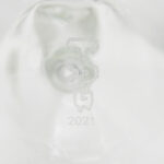 Close-up of TAG 12" Super Slit UFO Beaker base showing the etched logo and 2021 mark
